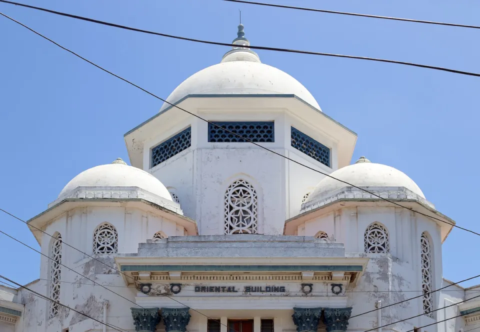 The Oriental Building in Mombasa, Kenya, featuring its distinctive triple-towered roof on the frontispiece.