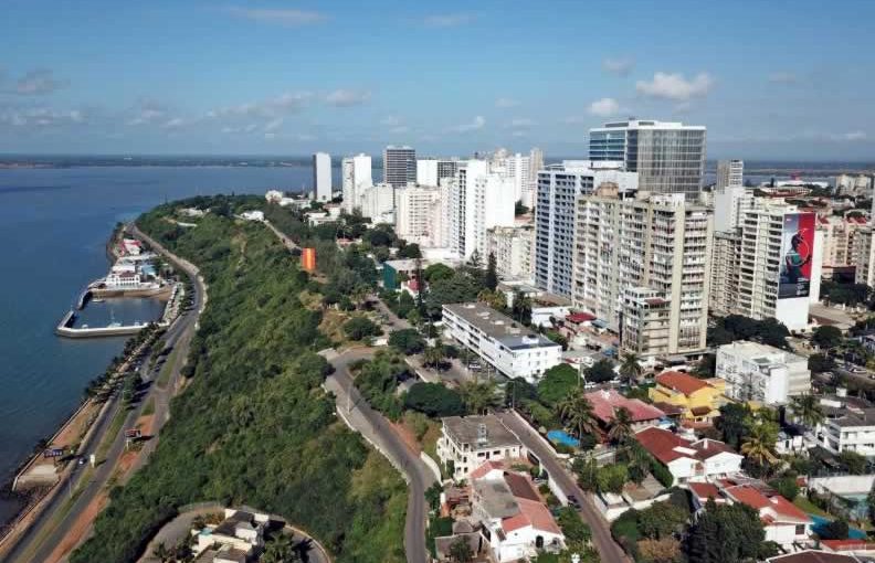 Aerial view of the scenic coastline of Maputo, Mozambique, showcasing the blue waters, sandy shores, and urban landscape.